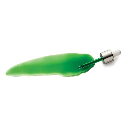Lay down of U.F.O. Ultra-Clarifying Face Oil with lay down dropper and green oil spill