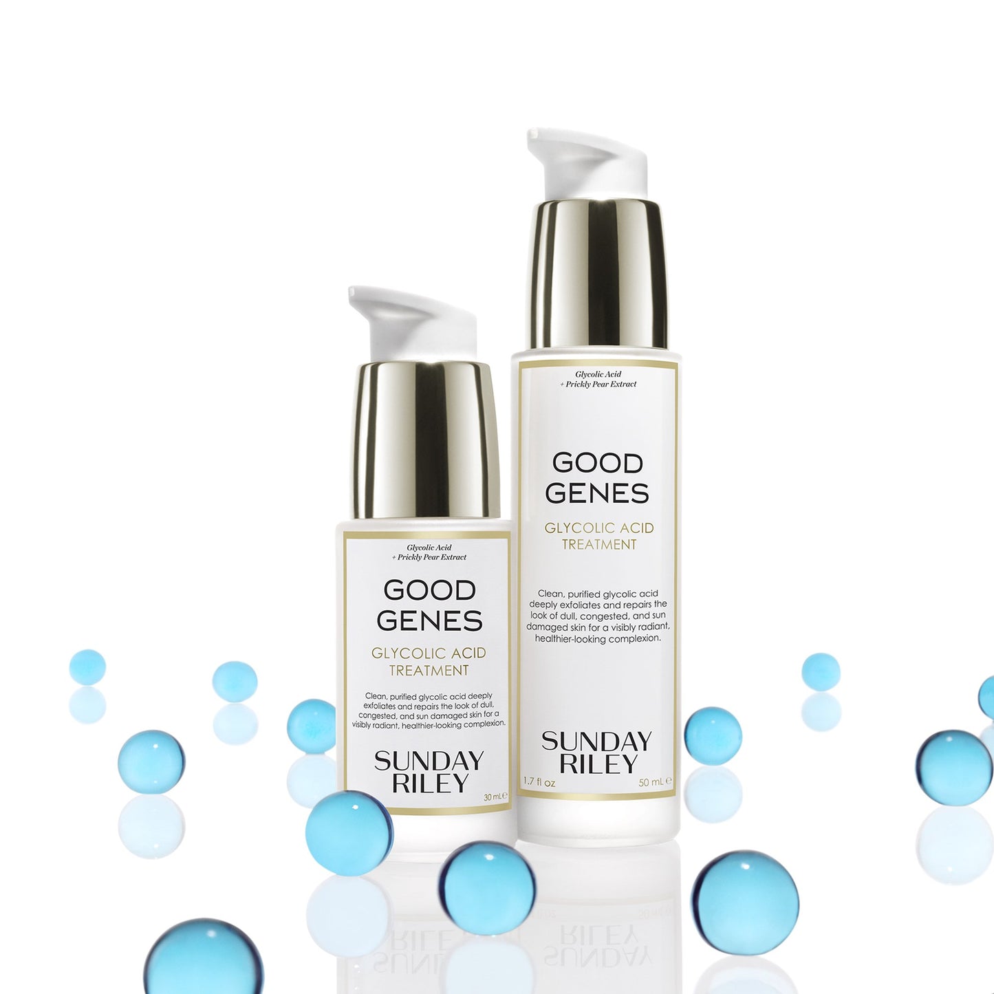 Standing 30mL and 50 mL bottles of Good Genes Glycolic frosted glass bottle with gold cap and white pump with light blue marbles.