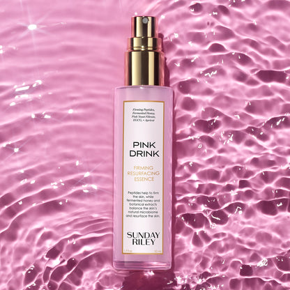 Pink Drink on water rippling, think pink swimming pool