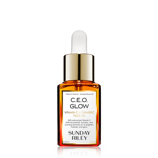 C.E.O. Glow Face Oil in a orange gradient glass bottle with silicon dropper. Edit alt text