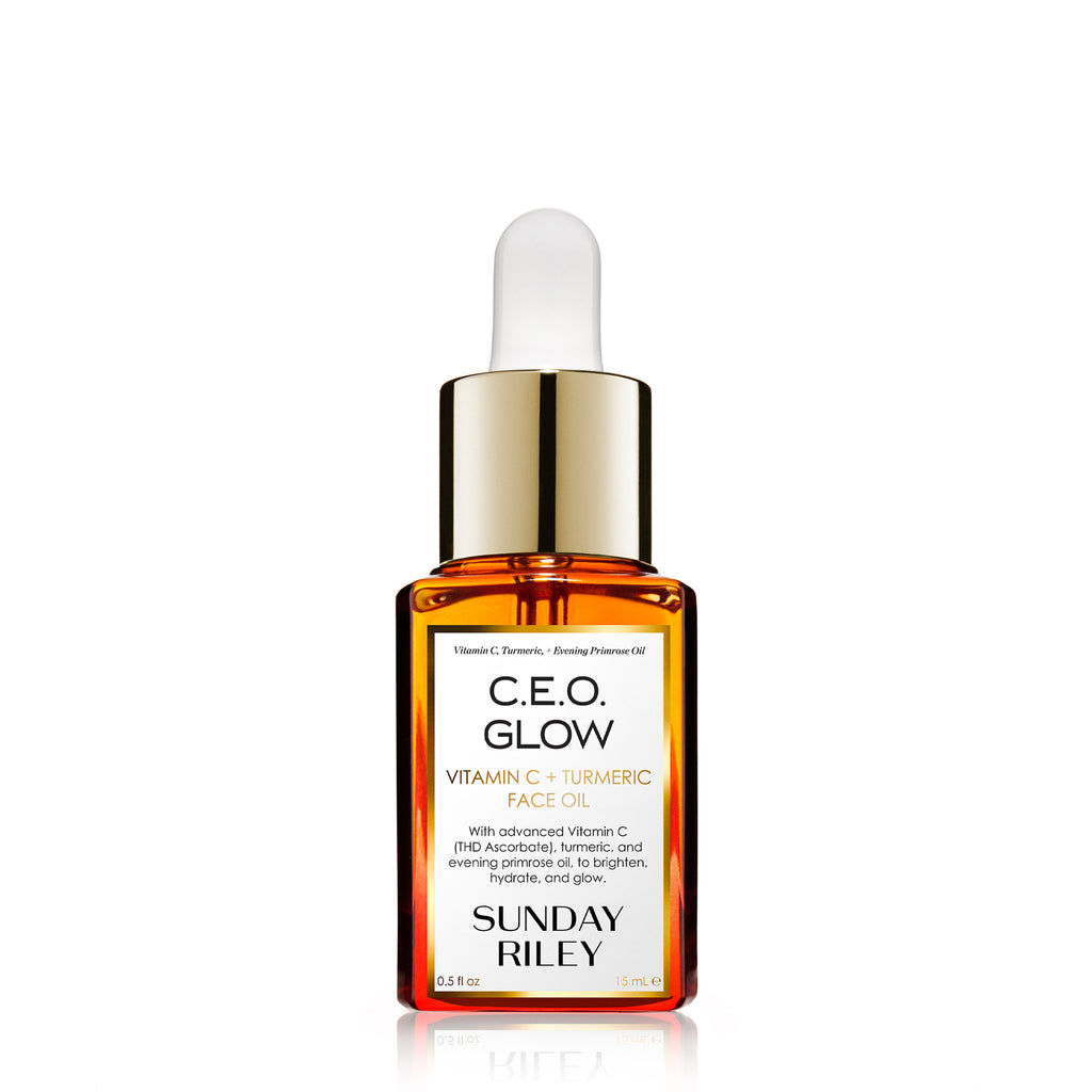C.E.O. Glow Face Oil in a orange gradient glass bottle with silicon dropper. Edit alt text