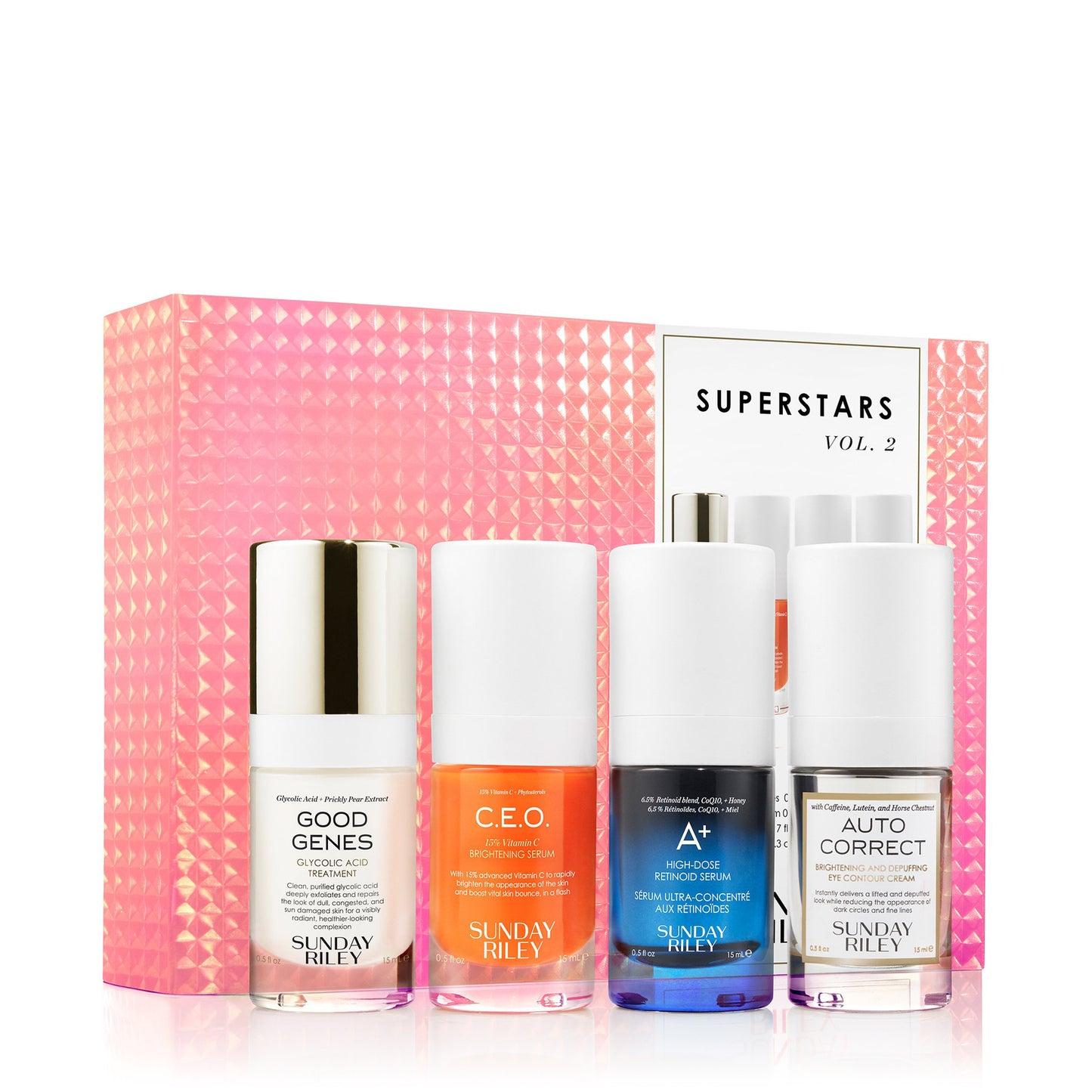 Product contents of Superstars Kit in front of salmon pink iridescent textured box. Kit contains 15ml bottles of Good Genes Glycolic Acid, CEO Serum, A+ Treatment, and Auto Correct Eye Cream
